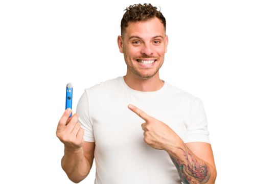 Young caucasian man holding a electronic cigarette isolated smiling and pointing aside, showing something at blank space.
