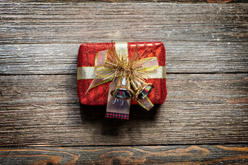 Red Gift Box on a Rustic Wooden Farmhouse Style Background