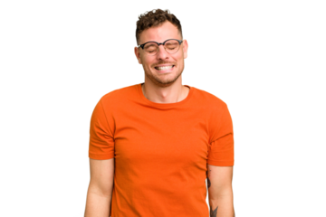 Young caucasian handsome man isolated laughs and closes eyes, feels relaxed and happy.