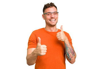 Young caucasian handsome man isolated raising both thumbs up, smiling and confident.