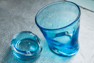 Broken glass made of recycled glass closeup