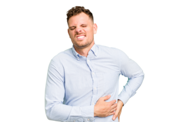 Young caucasian handsome man isolated having a liver pain, stomach ache.