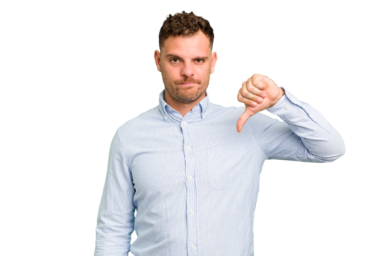 Young caucasian handsome man isolated showing thumb down, disappointment concept.