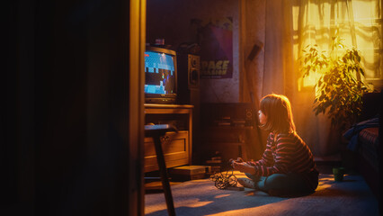 Young Girl Playing Eighties Eight Bit Arcade Video Game on a Console at Home in Her Room with Old-School Interior. Child Successfully Wins Hardest Level. Nostalgic Retro Childhood Concept.