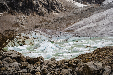 laguna congelada iceberg melting in high altitude andes Peruvian mountains near laguna Paron Huaraz