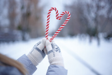 person holding a heart