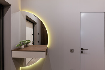 new interior design of the corridor with a mirror and lighting