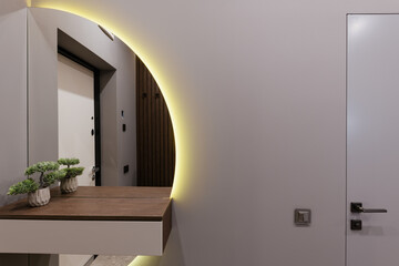 new interior design of the corridor with a mirror and lighting