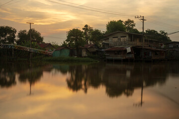 Fototapeta premium old wooden house by the river