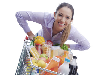 PNG file no background Cheerful woman pushing a full trolley - obrazy, fototapety, plakaty