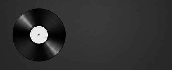 Vinyl record isolated on black background. Horizontal banner
