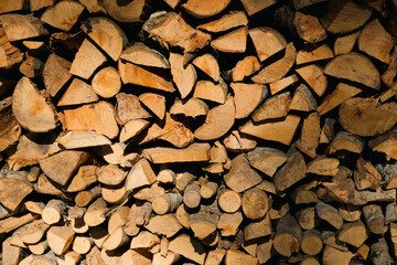 closeup firewood background, natural fuel concept and wooden industry