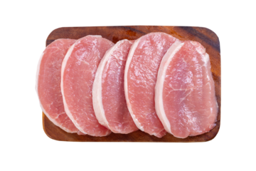 fresh pork chops on wooden board isolated on transparent background, top view