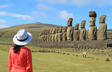 Female Visiting the Iconic Fifteen Moai Statues of Ahu Tongariki Ceremonial Platform on Easter...