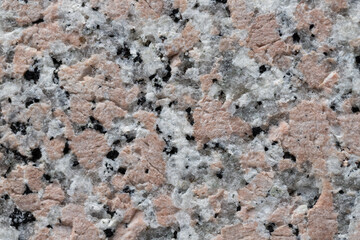 Macro texture of granite stone wall, close up abstract background