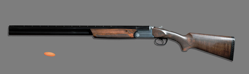 sports double barrel shotgun for shooting clay pigeons on a round stand