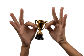 Male hands holding a small toy trophy with no background