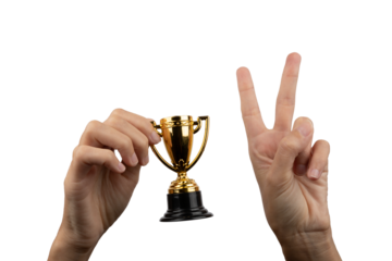 Young boy hands holding a small toy trophy with no background and doing the victory gesture