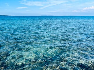 Fototapeta na wymiar Transparent sea surface, natural sea water background