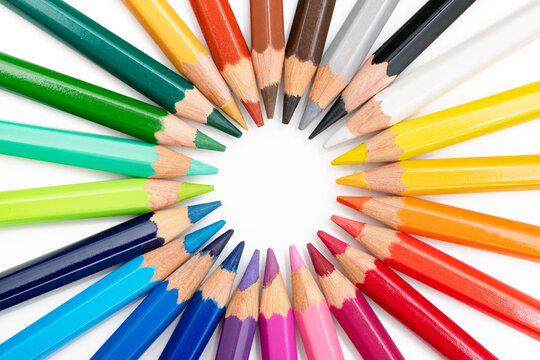Close-up of a set of colored pencils tips arranged in a circle. Close-up on colored pencil tips.