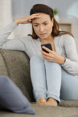 Obraz premium angry woman waiting for a mobile smartphone call