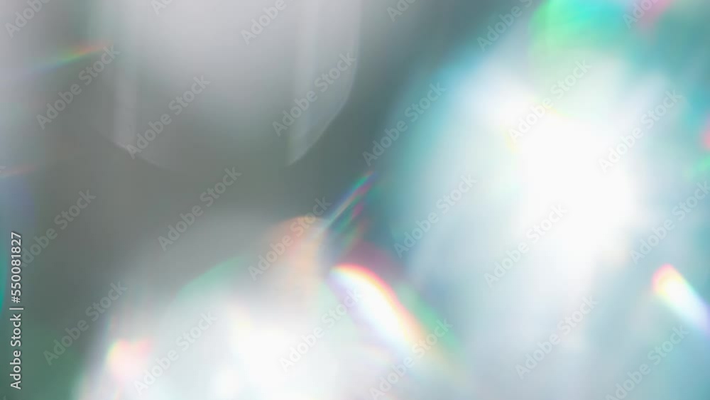 Wall mural rainbow glare and flicker. loop. the light passes through the facets of a slowly rotating diamond an