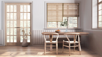 Farmhouse hallway with dining room in white and beige tones. Bleached wooden table with bench and chairs. Vintage interior design