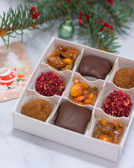 Assorted candies in a box. Christmas atmosphere