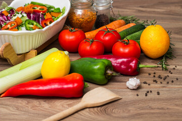 Healthy and fresh salad in bowl with vegetables and fruit