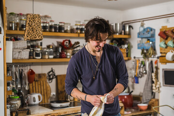 Fototapeta premium Handsome young man in the kitchen