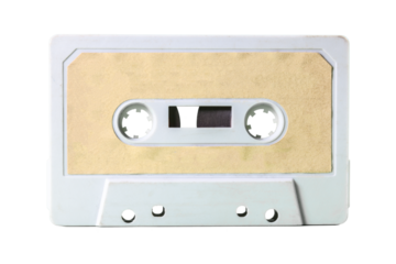 Isolated old vintage cassette tape, obsolete music tech from the 1980s. Light brown sand label, gray plastic body.
