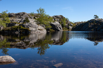 Fototapeta na wymiar Lake on the way to Preikestolen Norway