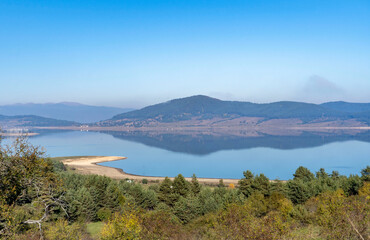 View of Batak Dam and reflection of mountains in the dam.Bulgaria