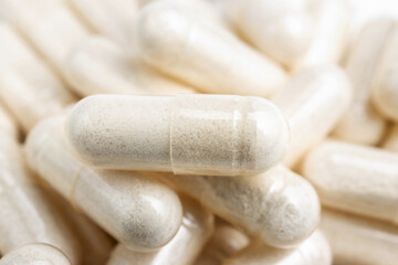 Fototapeta na wymiar White medicine capsules, vitamin pills or drugs, medication treatment, health care concept