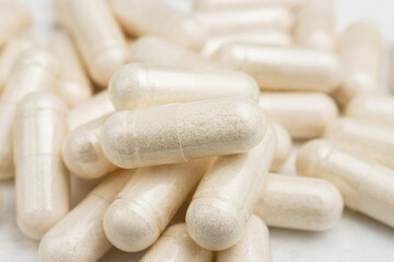 White medicine capsules, vitamin pills or drugs, medication treatment, health care concept