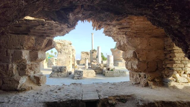 View of the historical landmark The Baths of Antoninus in Carthage , Tunisia. Unesco World Heritage Site. Archaeological Site of Carthage. Place of historic interest. Ancient ruins. 