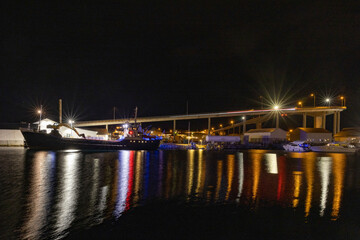 Fototapeta na wymiar Brønnøysund bridge.Light and colors in Brønnøysund harbor area, Nordland county, Norway, Europe 