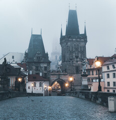 Naklejka premium Early foggy morning on Charles bridge Prague, Czech republic