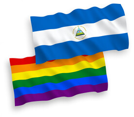 Fototapeta premium National vector fabric wave flags of Nicaragua and Rainbow gay pride isolated on white background. 1 to 2 proportion.