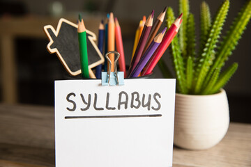 Syllabus inscription and pencils