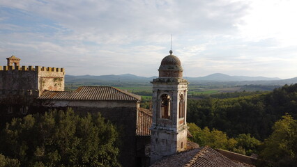 Naklejka premium A church with a bell tower, a castle with a beautiful landscape