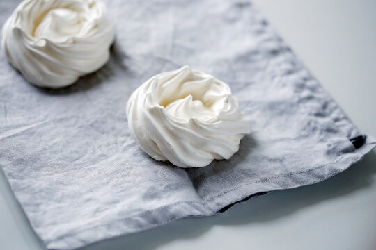 High angle view of meringues on napkin