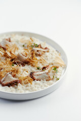 pearl barley porridge with parmesan, eel and tuna shavings