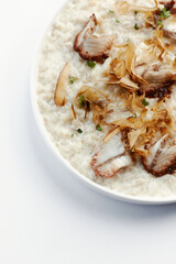 pearl barley porridge with parmesan, eel and tuna shavings