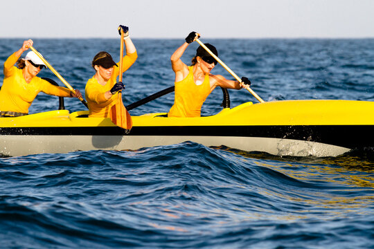 The women's Santa Barbara Outrigger Team paddles a six-person Unlimited Canoe off the coast of Santa Barbara, California.