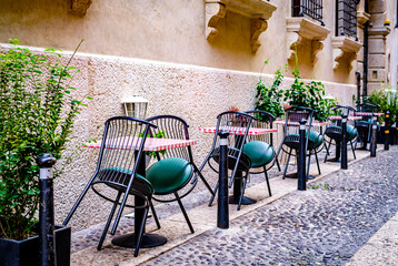 typical italian sidewalk cafe - restaurant
