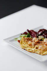 omelet with herbs and shrimps