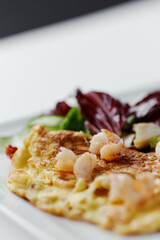 omelet with herbs and shrimps