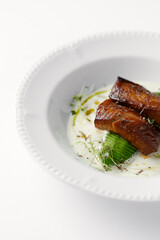 eel baked and laid on avocado