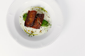 eel baked and laid on avocado